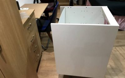 Flat pack assembly and installation of under sink storage